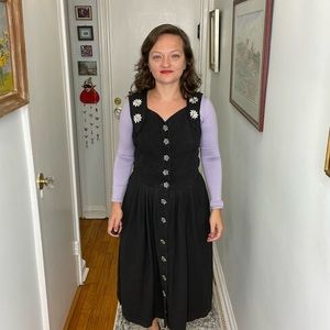 Traditional dirndl dress with flower buttons